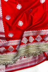 Red Mashru Silk Saree with Maharani Lace with white and gold patterns on a white background