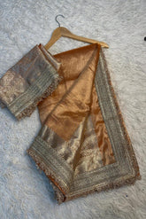 Golden Soft Tissue Silk Maharani Saree with premium lace.
