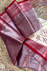 Lavender Color Pure Tissue Cotton Saree with Rich Red Border with intricate patterns on a textured surface, featuring the IJOR brand.