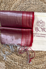 Lavender Color Pure Tissue Cotton Saree with Rich Red Border with a brand label on a beige carpet