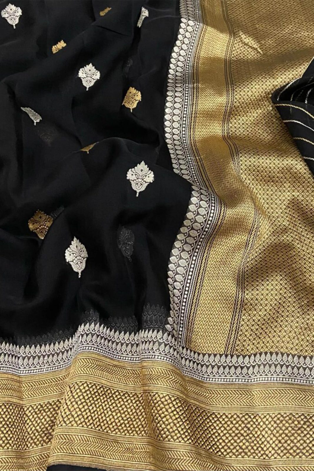Kora Orgenza Silk Black saree with intricate patterns