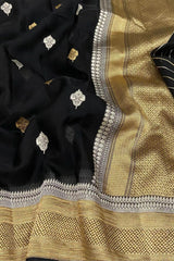 Kora Orgenza Silk Black saree with intricate patterns
