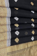 Kora Orgenza Silk Black saree with gold and white floral patterns