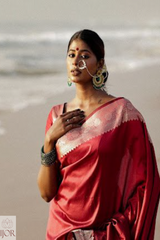 Banarasi Soft Semi Katan Silk Saree Red with jewelry on a beach