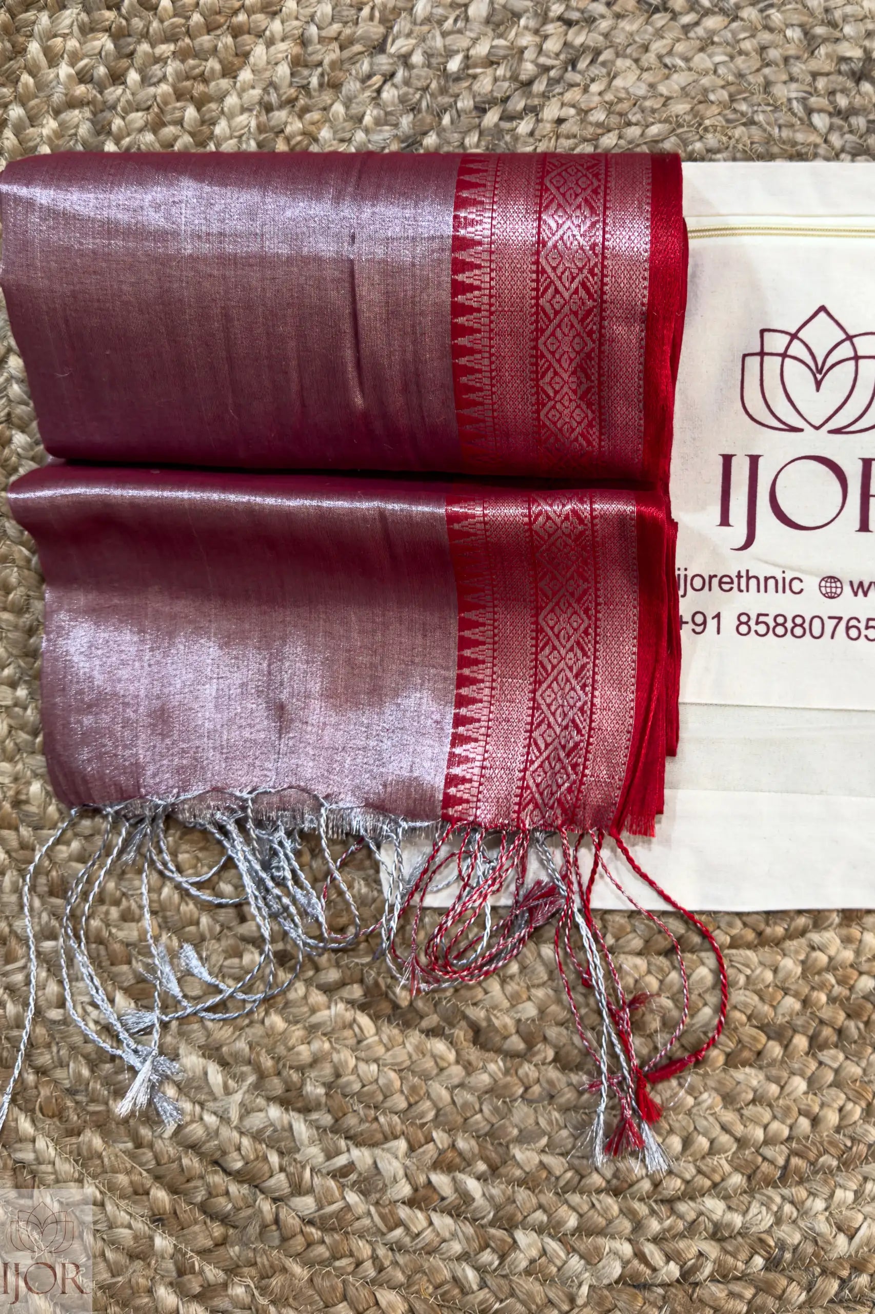 Lavender Color Pure Tissue Cotton Saree with Rich Red Borderr on a beige carpet, featuring the IJOR brand.