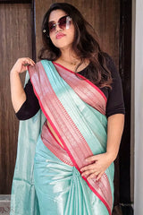Turquoise Blue Pure Tissue Cotton Saree with Rich Red Border indoors