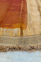 Close-up of a fabric with a lace border on a light background